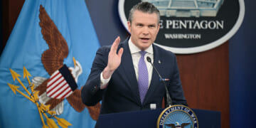 Secretary of War Pete Hegseth speaks at press room podium at the Pentagon on March 31, 2026.
