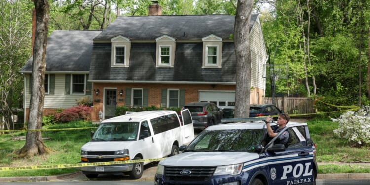 Law enforcement secure a crime scene outside the home of former Virginia Lt. Gov. Justin Fairfax on April 16, 2026, in Annandale, Virginia.