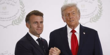 French President Emmanuel Macron and President Donald Trump shake hands during the greetings ceremony at the Gaza Peace Summit in Sharm El-Sheikh, on Oct. 13, 2025.