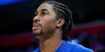 Jaden Ivey, playing for the Detroit Pistons, looks on at Little Caesars Arena in Detroit, Michigan, prior to a match against the Milwaukee Bucks on Dec. 6, 2025.