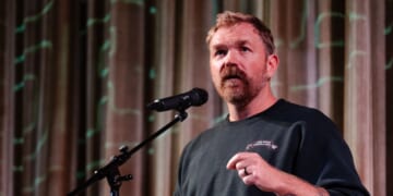 Graham Platner speaks at a town hall at the Leavitt Theater on Oct. 22, 2025, in Ogunquit, Maine.