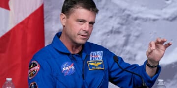 Artemis II commander and Navy Capt. Reid Wiseman talks to reporters Thursday at the Johnson Space Center in Houston.