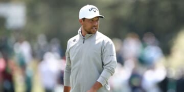 Xander Schauffele looks on from the 15th green during a practice round prior to the 2026 Masters Tournament at Augusta National Golf Club on April 8, 2026, in Augusta, Georgia.