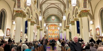 An audience waits in St Francis Cathedral for a Christmas concert to start on Dec. 9, 2025, in Santa Fe, New Mexico.