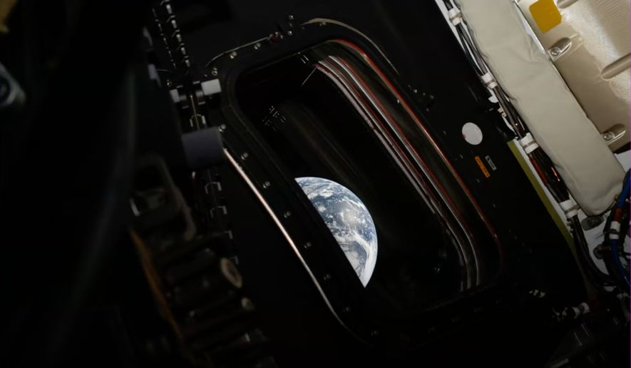 This image provided by NASA shows a downlink image of Earth taken by NASA’s Artemis II astronaut commander Reid Wiseman inside the Orion capsule on Friday, April 3, 2026. (NASA via AP)