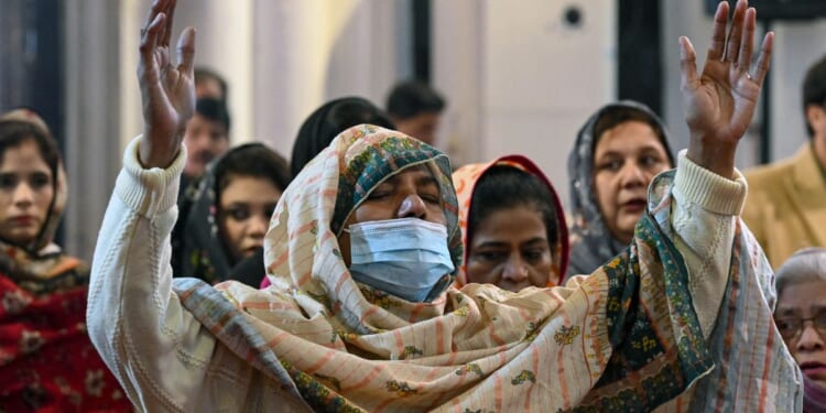Christians pray and praise God in Peshawar in northwest Pakistan on Dec. 25, 2025.