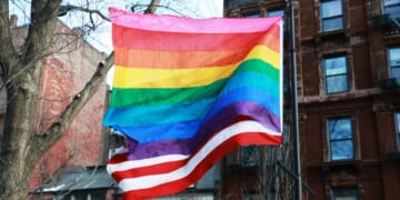 A "pride" flag flies in front of The American Flag at the Stonewall National Monument in New York City on Feb. 12, 2026.