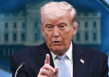 President Donald Trump said federal officials "are looking very hard" to find whoever leaked information about a pilot missing after being shot down over Iran.