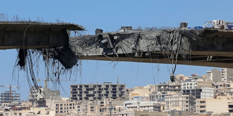 A view of the B1 bridge is pictured Thusrday, a day after it was destroyed by a strike in Karaj, around 20 miles southwest of Tehran, Iran.