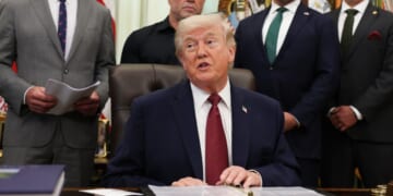 President Trump sits in the Oval Office alongside advisors and administration officials on April 18, 2026.