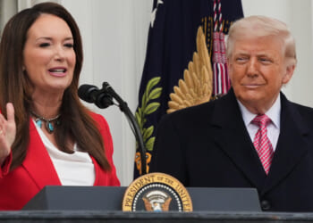 President Donald Trump listens to Agriculture Secretary Brooke Rollins speak during an event with farmers on the South Lawn of the White House on Friday, March 27, 2026, in Washington, D.C.