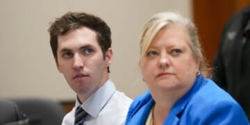 Tyler Robinson, left, accused in the fatal shooting of Charlie Kirk, sits beside defense attorney Kathryn Nester during a hearing in Fourth District Court on Jan. 16, 2026, in Provo, Utah.