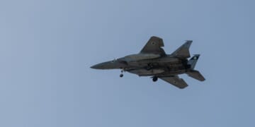 An F-15 fighter jet flies on March 20, 2026 in Rehovot, Israel.