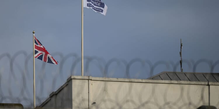 An HM Prison Service flag flies next to a Union Flag at HM Prison Pentonville in London, UK on Oct. 22, 2024.