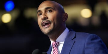 Rep. Shomari Figures, an Alabama Democrat seen on the campaign trail in 2024, appeared surprised at the crowd's response to his question Monday night at a town hall meeting. near Mobile