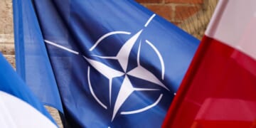 The NATO flag flies amongst others on February 20, 2026.