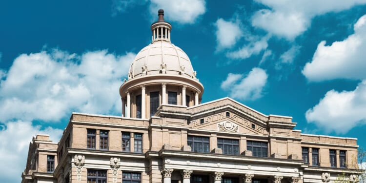 The Harris County Courthouse in downtown Houston, Texas, on a sunny day.