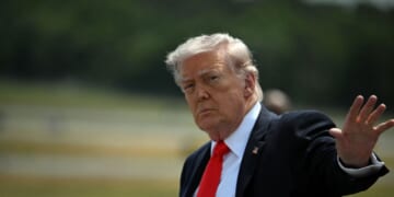President Donald Trump waves after his arrival at Ocala International Airport, in Ocala, Florida, on May 1, 2026.