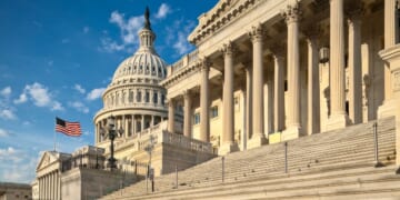 A view of the east facade of the US Capitol basking in the early morning sun.