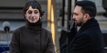 Zohran Mamdani is sworn in as New York City mayor as his wife Rama Duwaji looks on at City Hall on Jan. 1, 2026, in New York City.