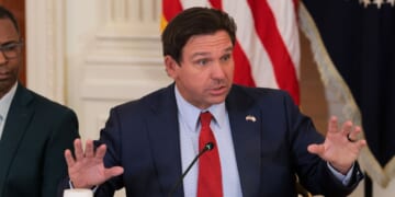 Florida Gov. Ron DeSantis speaks during a roundtable discussion on college sports in the East Room of the White House on March 6, 2026, in Washington, D.C.