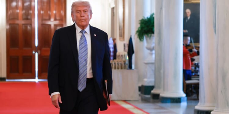 President Donald Trump, heading into a meeting in the East Room of the White House on Monday.